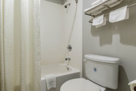 Deluxe Suite, 1 King Bed | Bathroom | Bathtub, free toiletries, hair dryer, towels