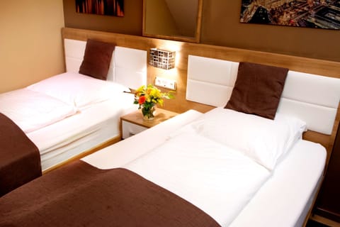 Economy Twin Room, Shared Bathroom (Two Rooms Share One Bathroom) | Minibar, desk, iron/ironing board, free WiFi