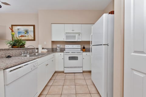 Condo, 2 Bedrooms, Beachfront (1404) | Private kitchen | Full-size fridge, microwave, oven, stovetop