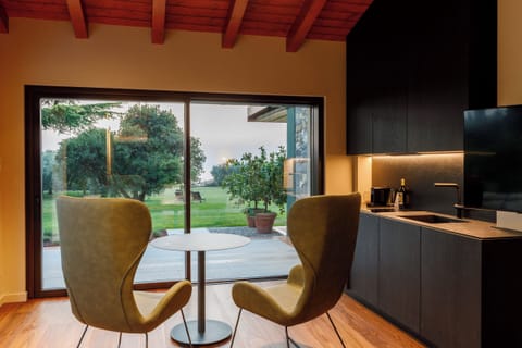 Luxury Studio Suite, Patio, Lake View (Accessible) | Premium bedding, minibar, in-room safe, desk