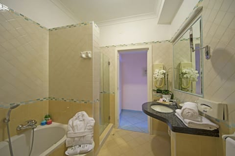 Junior Suite, Balcony, Sea View | Bathroom | Shower, free toiletries, hair dryer, slippers