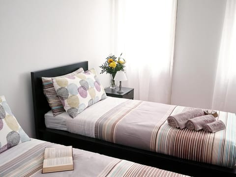 Desk, laptop workspace, free WiFi, bed sheets