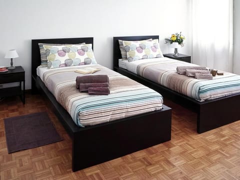 Desk, laptop workspace, free WiFi, bed sheets