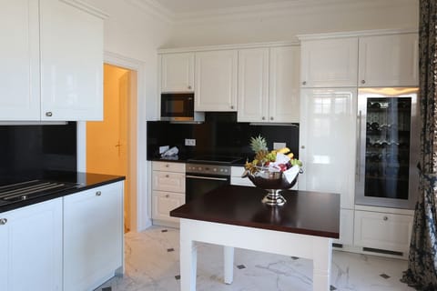 Grand Suite, 2 Bedrooms, Kitchen, Garden Area | Private kitchen | Fridge, microwave, oven, stovetop