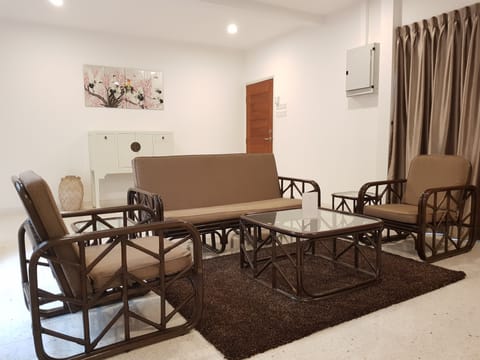 Villa 8M (100m from hotel) | Living area | Flat-screen TV