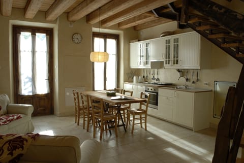 Family Apartment | Private kitchen | Electric kettle, highchair, paper towels