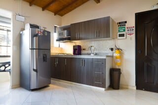 Apartment, 1 Bedroom, City View (301) | Private kitchenette | Fridge, microwave, stovetop, coffee/tea maker