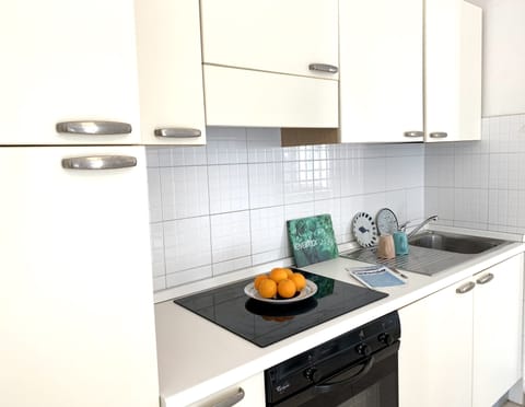 Apartment, 1 Bedroom, Accessible, Ocean View (Piazza Colombo 7) | Private kitchen | Fridge, oven, stovetop, espresso maker