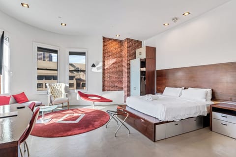 Superior Room, 1 King Bed, Private Bathroom, City View (Self check-in) | Desk, laptop workspace, blackout drapes, iron/ironing board