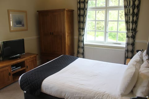 Standard Double Room, 1 Bedroom | Desk, iron/ironing board, free cribs/infant beds, rollaway beds