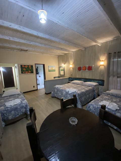 Quadruple Room | Minibar, in-room safe, blackout drapes, iron/ironing board