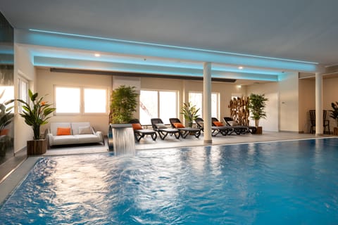 Indoor pool, open 9:00 AM to 9:00 PM, sun loungers