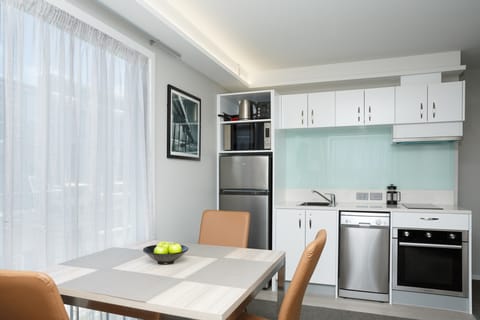 Apartment, 1 Bedroom | Private kitchen | Fridge, microwave, dishwasher, coffee/tea maker