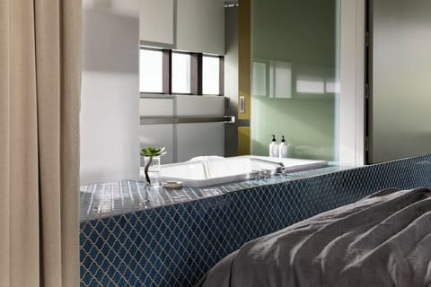 Suite Four | Bathroom | Free toiletries, hair dryer, bathrobes, towels