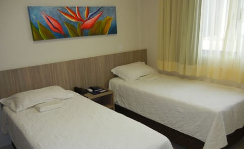 Twin Room | Minibar, desk, blackout drapes, free WiFi