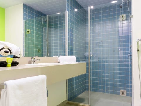 Shower, eco-friendly toiletries, hair dryer, towels