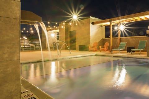 Seasonal outdoor pool, open 7:00 AM to 11:00 PM, sun loungers