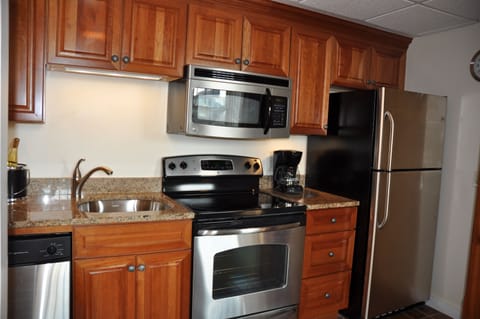 Suite, 2 Bedrooms | Private kitchen | Fridge, microwave, dishwasher, coffee/tea maker