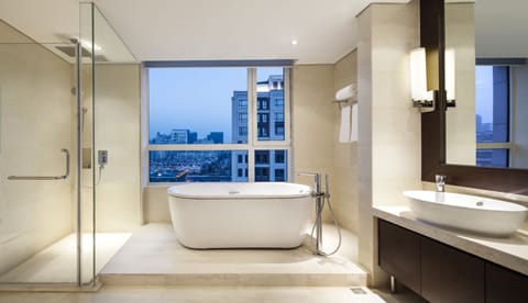 Premier Suite, 2 Bedrooms, Kitchen | Bathroom | Separate tub and shower, free toiletries, hair dryer, towels