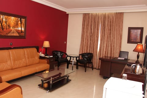 Executive Room | Living area | Flat-screen TV