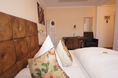 Hypo-allergenic bedding, pillowtop beds, individually decorated, desk