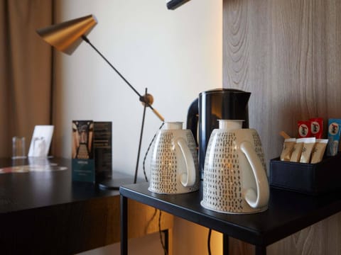 Premium bedding, desk, blackout drapes, soundproofing