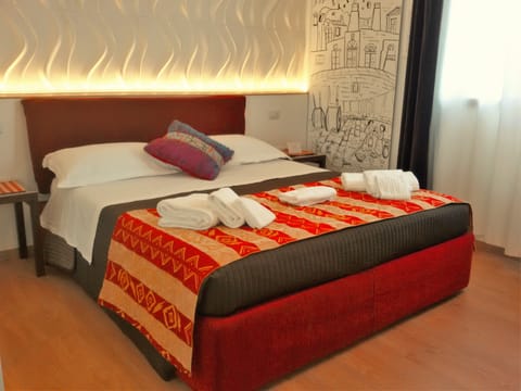 Deluxe Room, 1 Queen Bed with Sofa bed, Private Bathroom | Down comforters, free WiFi, bed sheets