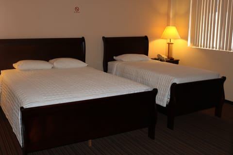 Triple Room (1 Queen Bed and 1 Single Bed) | Blackout drapes, free WiFi, bed sheets