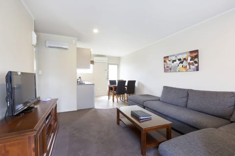 2 Bedroom Unit | Living room | 32-inch flat-screen TV with satellite channels, TV, DVD player