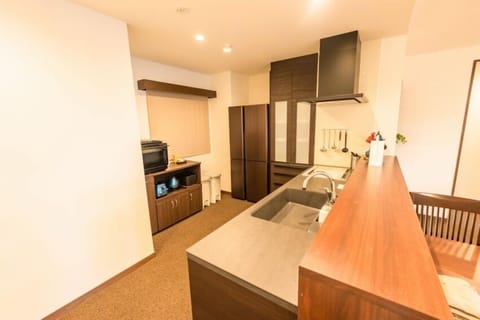 Grand Room | Private kitchen | Fridge