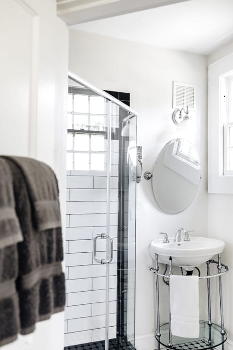 Deluxe Room | Bathroom | Designer toiletries, hair dryer, bathrobes, towels