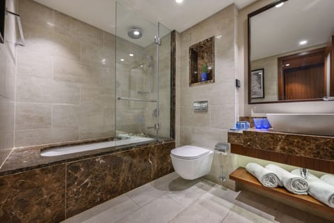 Family Room | Bathroom | Designer toiletries, hair dryer, bathrobes, slippers