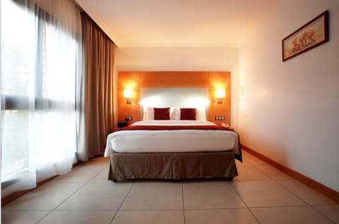 Executive Apartment, 1 Bedroom, City View | Premium bedding, down comforters, Select Comfort beds, minibar
