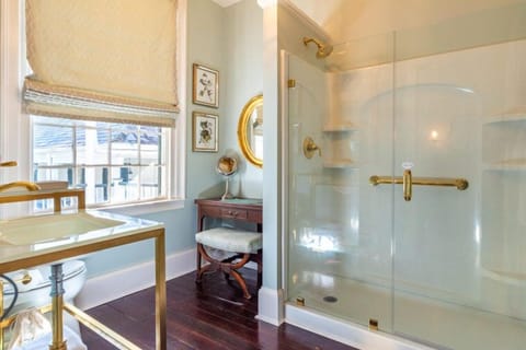 The Marjorie Room | Bathroom | Combined shower/tub, rainfall showerhead, designer toiletries, towels