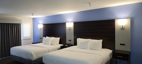 Superior Room, Multiple Beds, Refrigerator & Microwave | Desk, blackout drapes, iron/ironing board, free WiFi