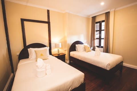 Deluxe Twin Room | Minibar, in-room safe, desk, free WiFi