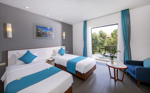 Deluxe Twin Room, Balcony, Pool View | Minibar, in-room safe, desk, blackout drapes