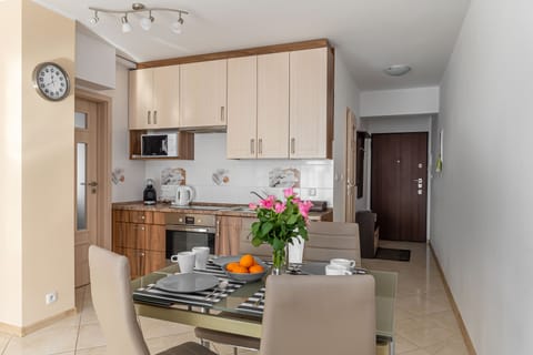 Apartment, 2 Bedrooms | Private kitchen | Fridge, microwave, coffee/tea maker, electric kettle