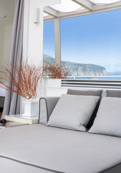 Executive Suite, Terrace, Sea View | Minibar, in-room safe, desk, blackout drapes