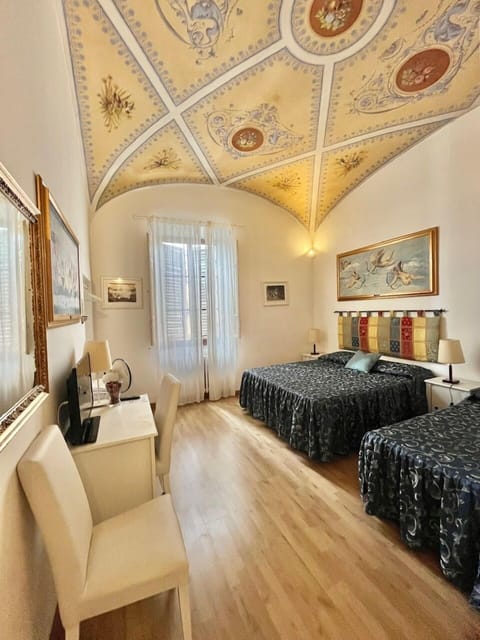 Basic Triple Room | Minibar, desk, iron/ironing board, free WiFi