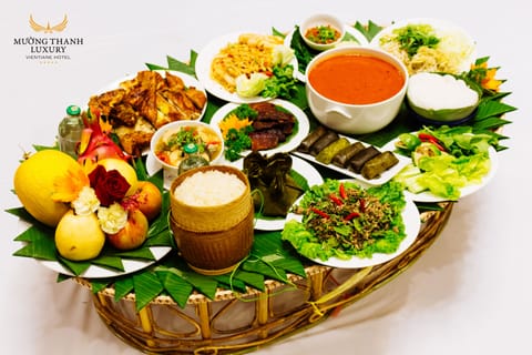 2 restaurants, breakfast, lunch, dinner served; Laotian cuisine