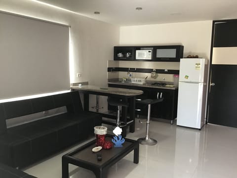 Apartment, 1 Bedroom | Living room | 32-inch flat-screen TV with cable channels, TV