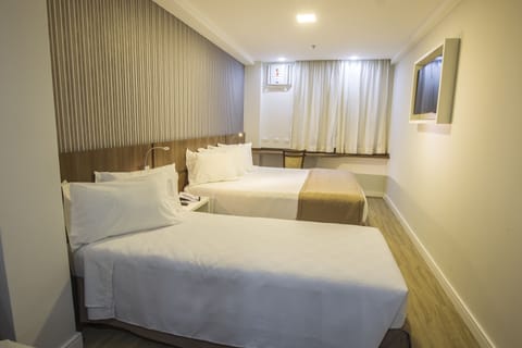 Superior Triple Room | Minibar, in-room safe, desk, free WiFi