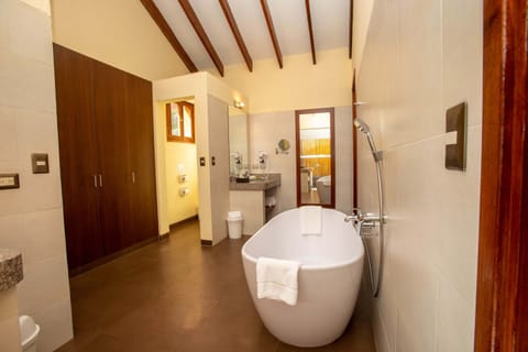 Superior Villa, 1 King Bed | Bathroom | Combined shower/tub, free toiletries, hair dryer, bathrobes