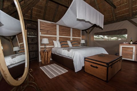 Colonial Luxury Safari Tent | Egyptian cotton sheets, premium bedding, pillowtop beds, minibar