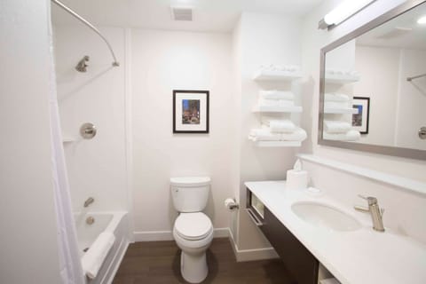 Room, 2 Queen Beds, Non Smoking, Refrigerator | Bathroom | Combined shower/tub, free toiletries, hair dryer, towels