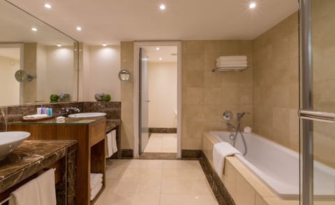 Presidential Suite, 1 King Bed | Bathroom | Combined shower/tub, deep soaking tub, rainfall showerhead