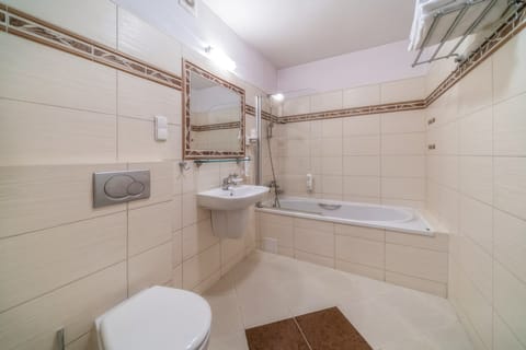 Studio (3 adults direct access to therms) | Bathroom | Deep soaking tub, hair dryer, towels