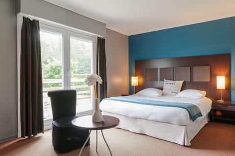 Deluxe Double Room, Garden Area | Minibar, in-room safe, individually decorated, soundproofing