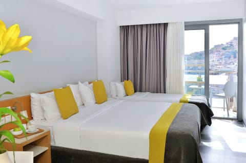 Standard Triple Room, City View | Minibar, in-room safe, soundproofing, free WiFi